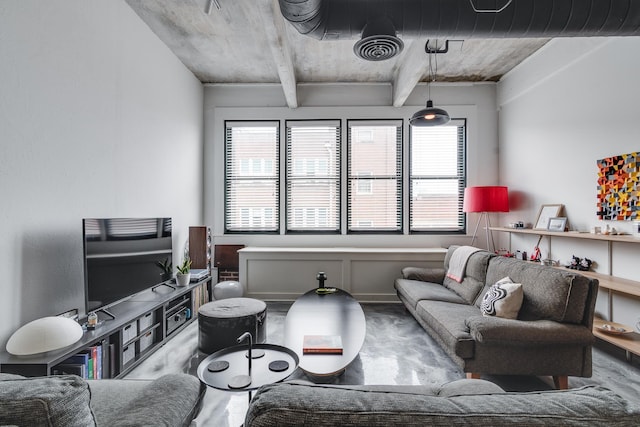 living room with visible vents and wood finished floors