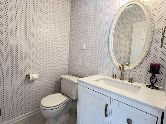 half bath with toilet and vanity