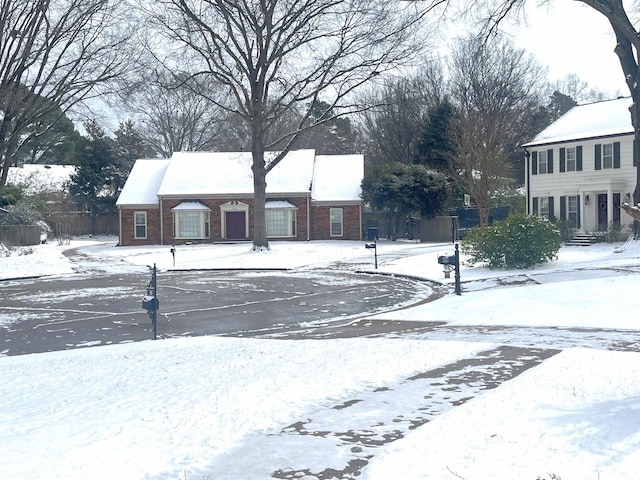 view of yard layered in snow