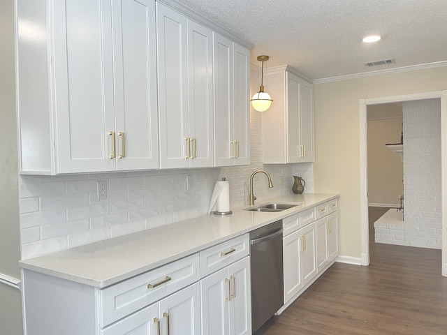 kitchen featuring decorative light fixtures, visible vents, white cabinetry, a sink, and dishwasher