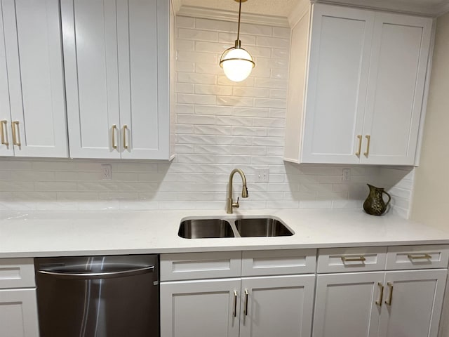 kitchen featuring decorative light fixtures, tasteful backsplash, a sink, light stone countertops, and dishwasher