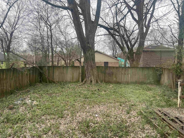 view of yard featuring a fenced backyard