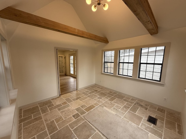 unfurnished room with a chandelier, high vaulted ceiling, stone tile floors, baseboards, and beam ceiling