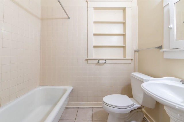 full bath featuring built in features, tile patterned flooring, a sink, and toilet