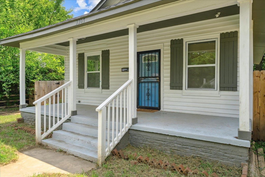 property entrance with a porch