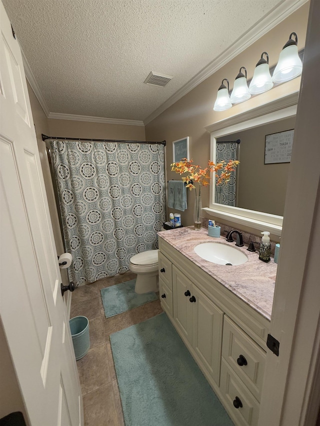 bathroom with crown molding, visible vents, toilet, vanity, and a textured ceiling