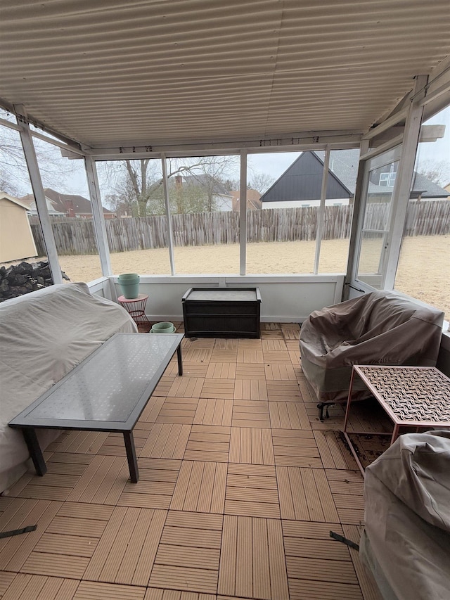 sunroom / solarium featuring plenty of natural light