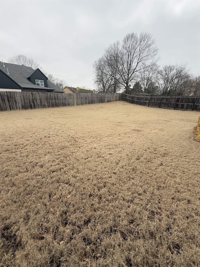 view of yard featuring fence