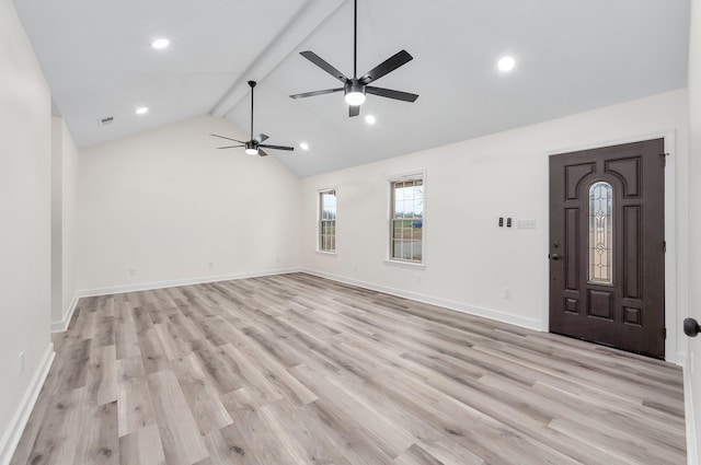 unfurnished living room with light wood-style flooring, visible vents, baseboards, and beam ceiling