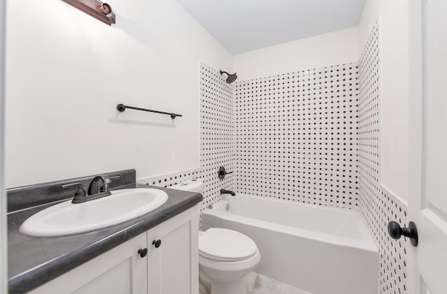 bathroom featuring shower / washtub combination, vanity, and toilet