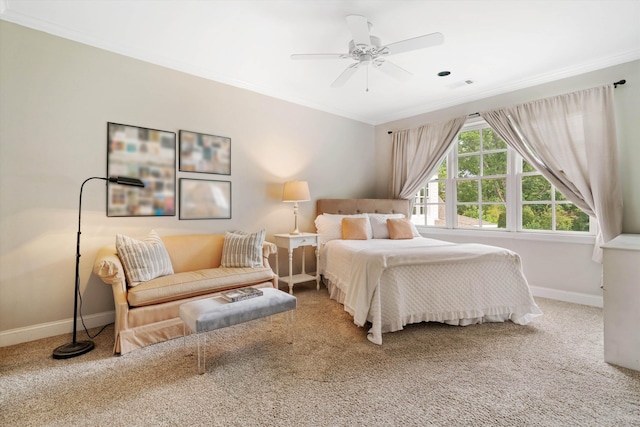 bedroom with crown molding, visible vents, and baseboards