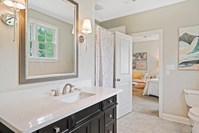 bathroom featuring toilet, ensuite bath, tile patterned floors, crown molding, and vanity