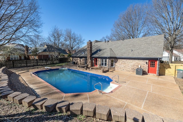 view of pool featuring a patio area, a fenced backyard, a gate, and a fenced in pool