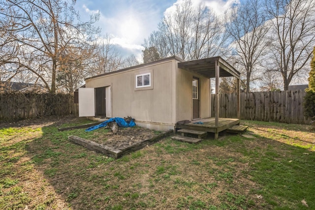 view of outbuilding with a fenced backyard