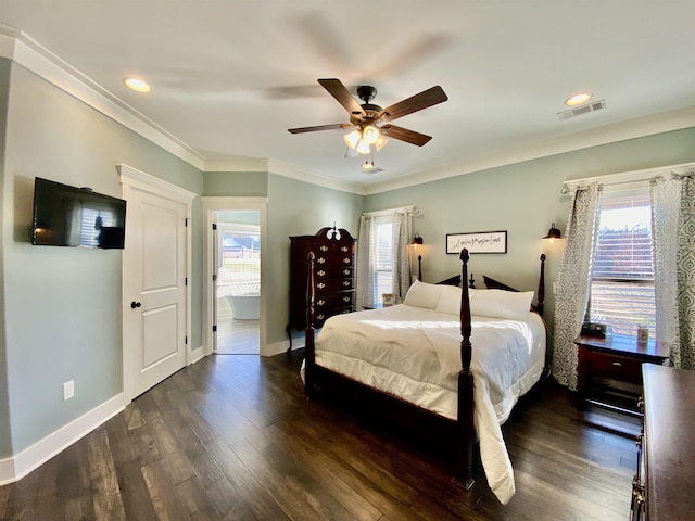 bedroom with dark wood-style flooring, crown molding, visible vents, ceiling fan, and baseboards