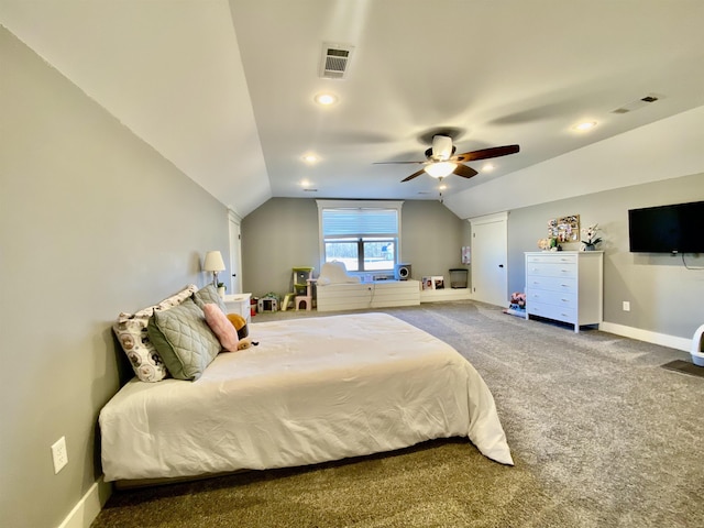 carpeted bedroom with lofted ceiling, baseboards, and visible vents