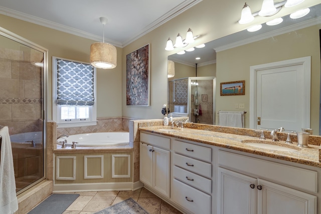 full bathroom with double vanity, a stall shower, ornamental molding, and a sink