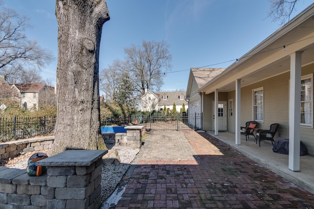 view of patio / terrace with fence