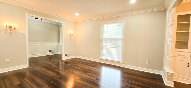 unfurnished room with dark wood-style floors, visible vents, and recessed lighting