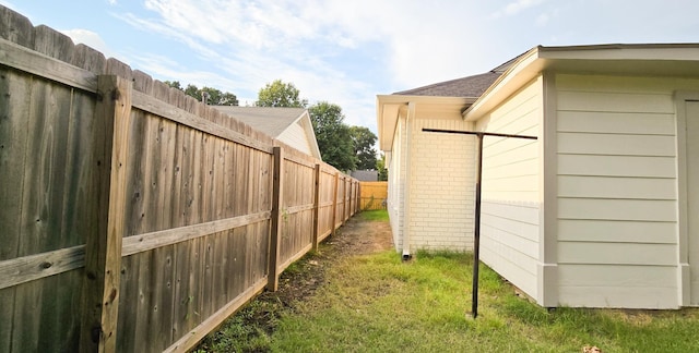 exterior space featuring a fenced backyard