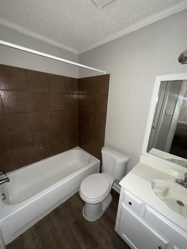 bathroom with a textured ceiling, toilet, shower / bath combination, wood finished floors, and vanity