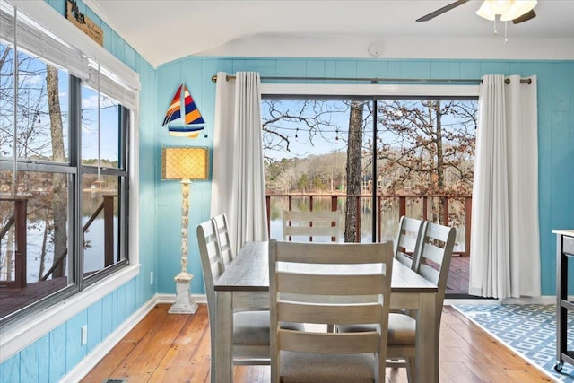 dining space featuring a wealth of natural light, ceiling fan, and wood finished floors