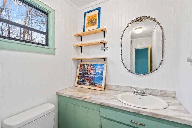 bathroom with vanity and toilet