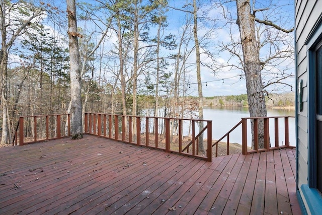 deck featuring a water view