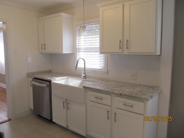 kitchen with a sink, white cabinetry, stainless steel dishwasher, and ornamental molding