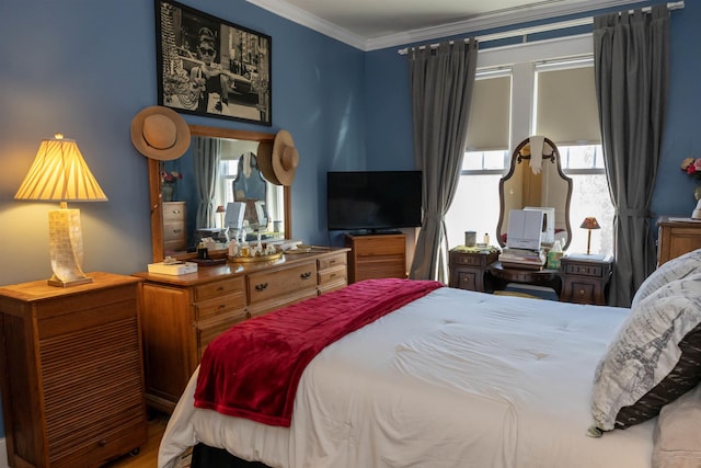 bedroom with ornamental molding