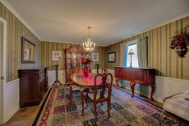 dining area with wallpapered walls, ornamental molding, and a textured ceiling