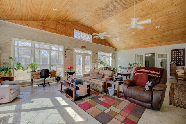 living area with light tile patterned floors, high vaulted ceiling, french doors, and wooden ceiling