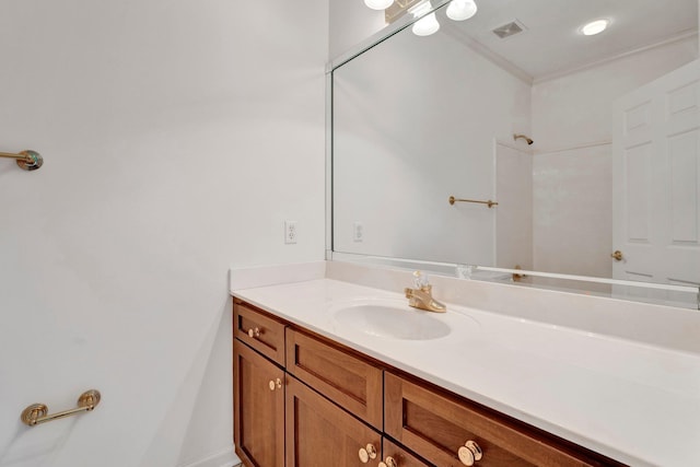 bathroom featuring visible vents and vanity