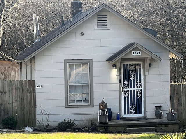 view of front of property with fence