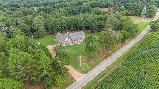 aerial view featuring a rural view and a view of trees