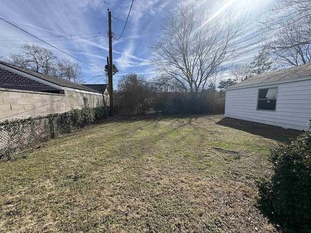 view of yard featuring fence