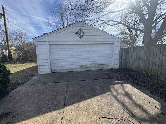 detached garage with fence