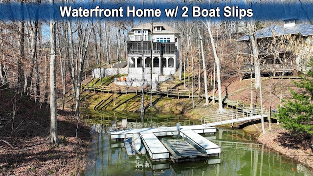 dock area featuring a water view