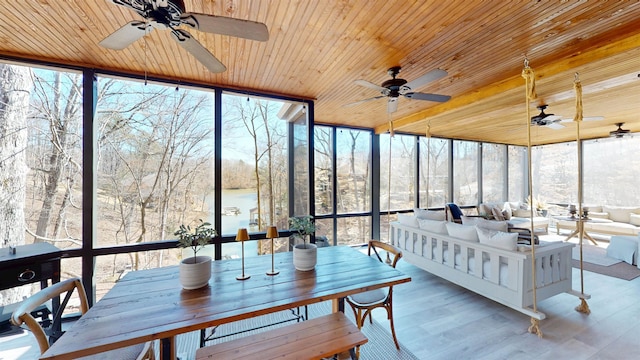 sunroom / solarium with wood ceiling