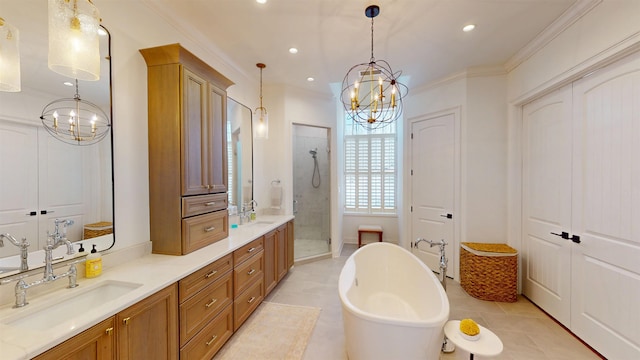 full bath featuring a freestanding tub, a sink, a shower stall, double vanity, and crown molding