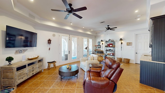 living area featuring light tile patterned floors, recessed lighting, visible vents, french doors, and ornamental molding