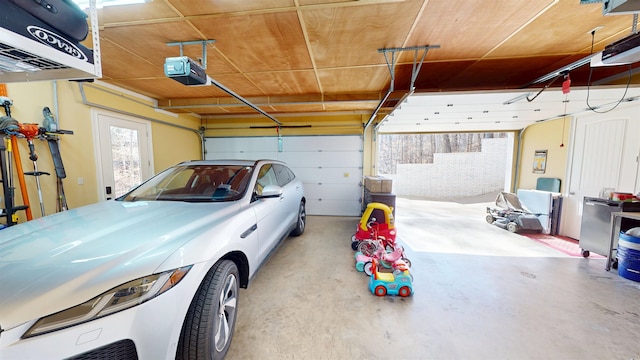 garage featuring a garage door opener