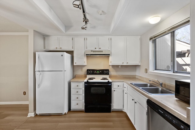 kitchen featuring electric range, dishwasher, freestanding refrigerator, under cabinet range hood, and a sink