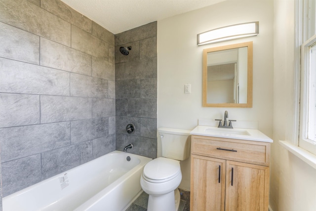 bathroom featuring shower / washtub combination, vanity, and toilet