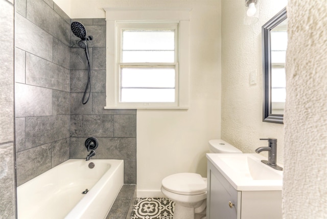 bathroom featuring shower / bathing tub combination, vanity, and toilet