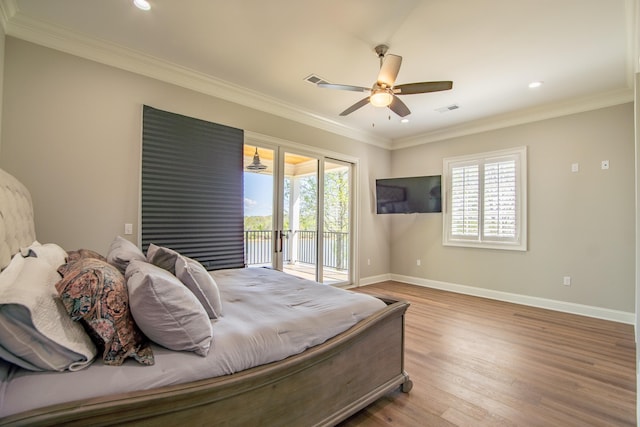 bedroom with access to outside, multiple windows, visible vents, and ornamental molding