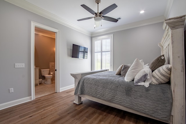 bedroom with baseboards, visible vents, ornamental molding, and wood finished floors