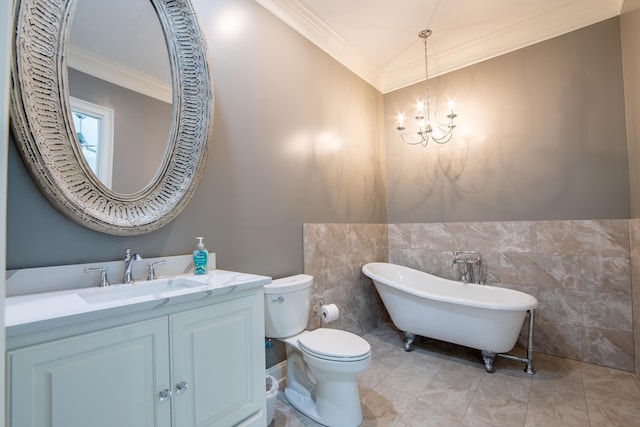 bathroom featuring toilet, a freestanding tub, ornamental molding, and a notable chandelier