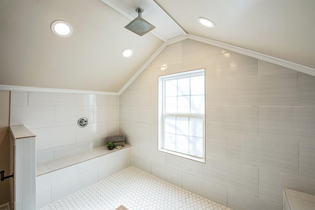 full bath featuring recessed lighting, vaulted ceiling, and a tile shower