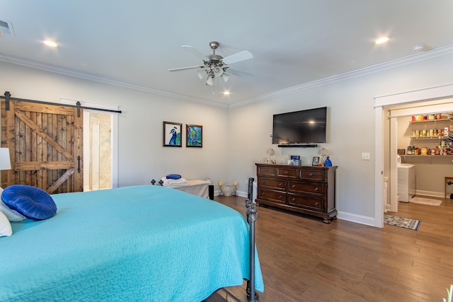 bedroom with a barn door, baseboards, dark wood finished floors, ornamental molding, and recessed lighting